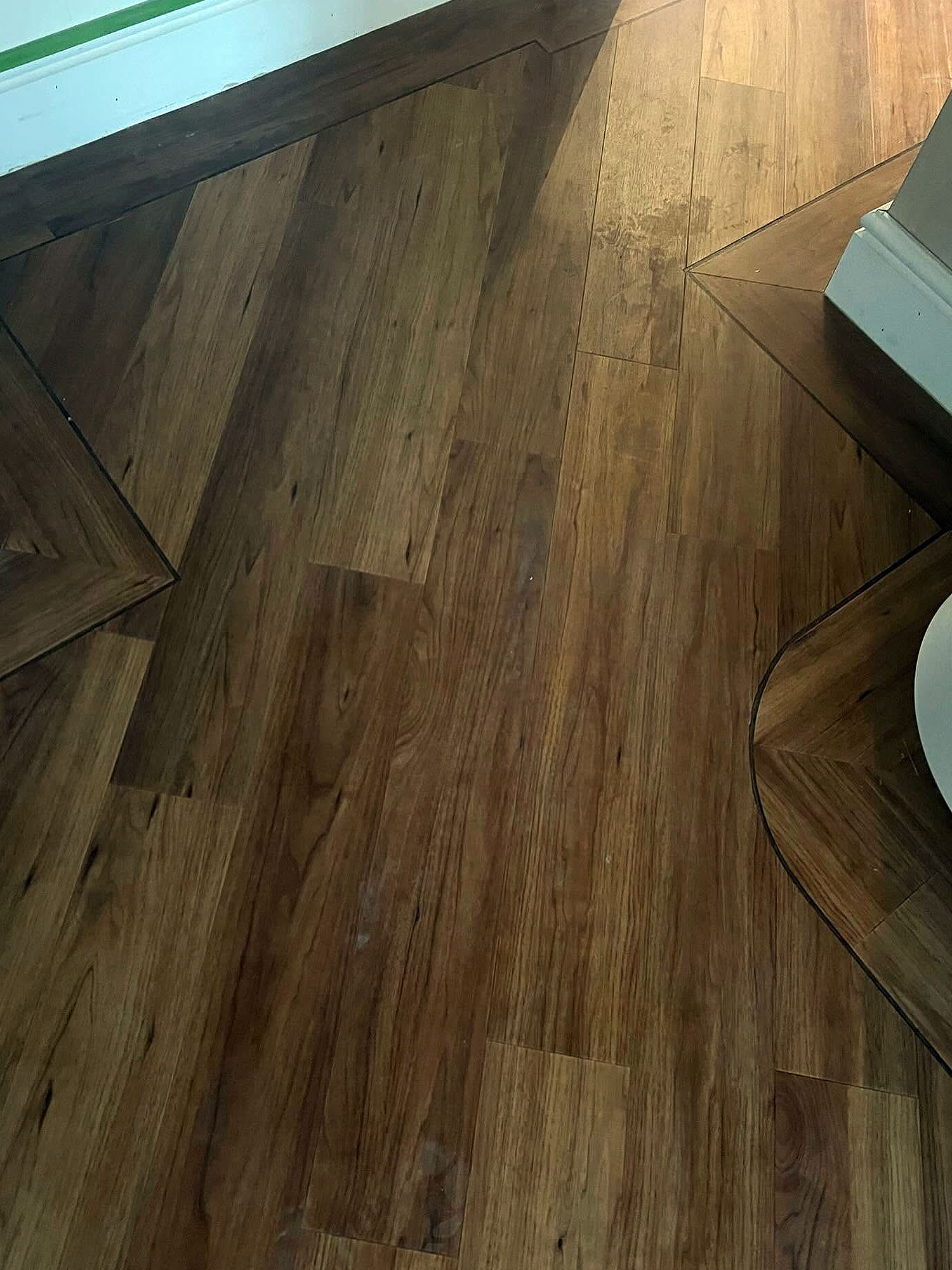 Luxury vinyl tile flooring installation for modern kitchen in Surrey